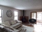 Living room with woodstove...room can open to sunroom no image