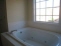 Master bath with whirlpool tub no image