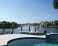 Pool overlooking waterway no image